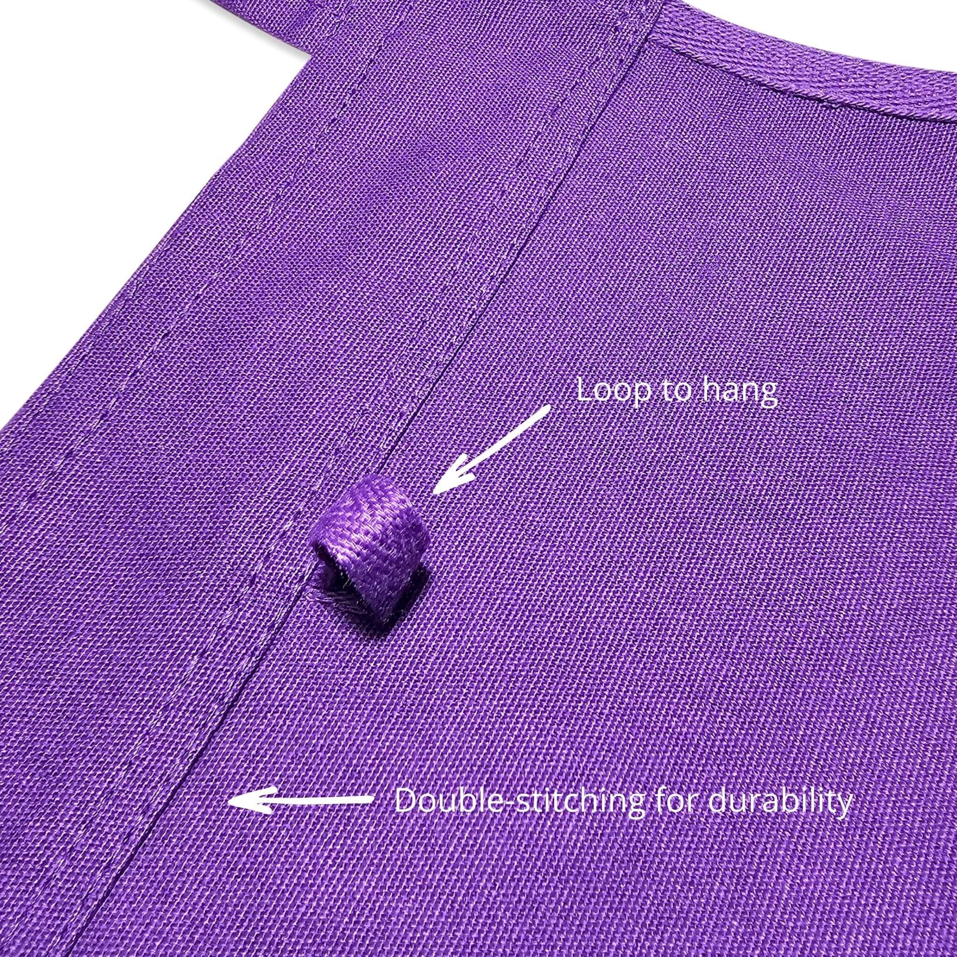 A close-up image of a kid's purple apron from Little Change Creators.