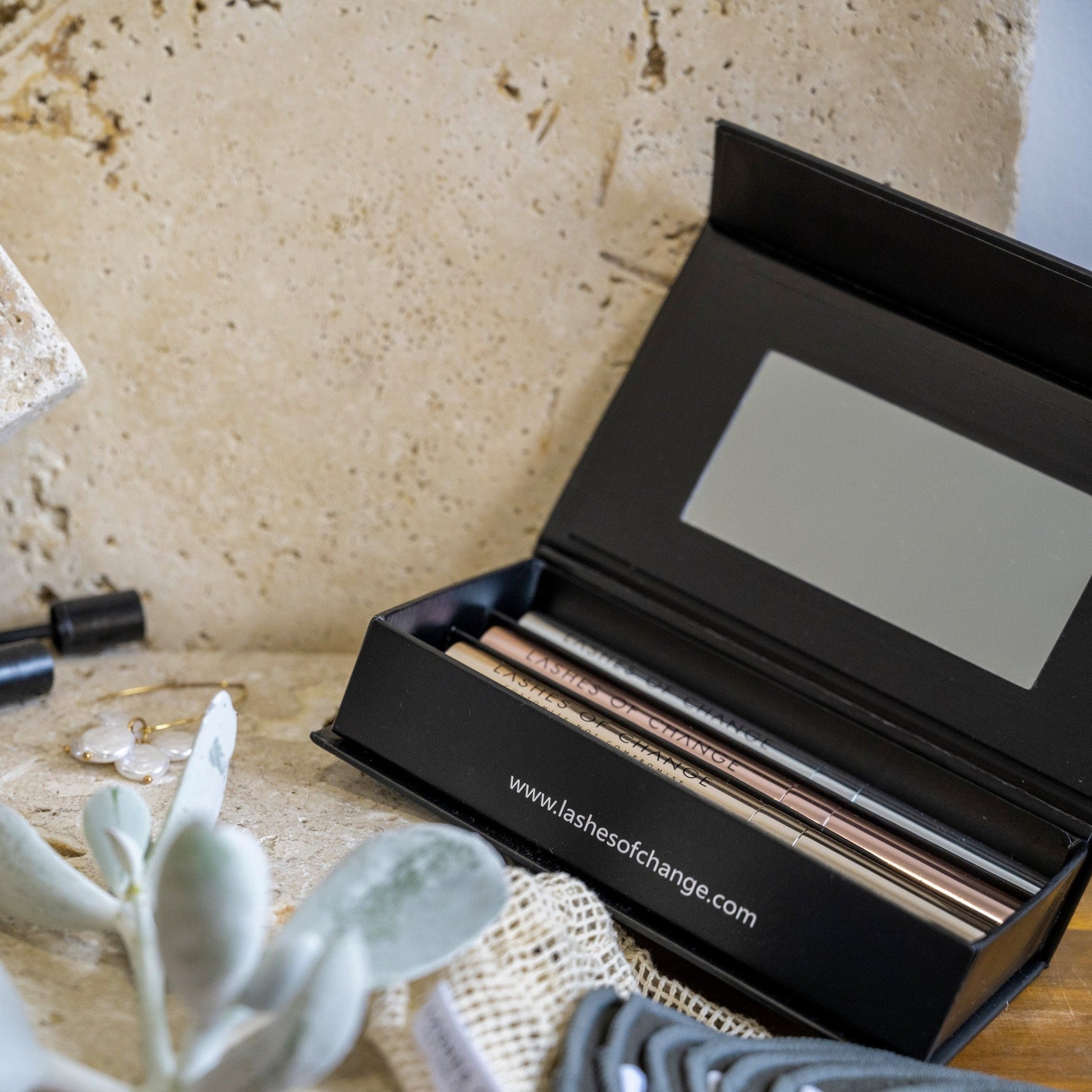 Lashes of hange mascara travle and storage box. Refillable custom mascara. Cruelty free eye makeup. Best sensitive eyes custom mascara. Vegan makeup Australia. Eco friendly mascara. The best mascara in Australia