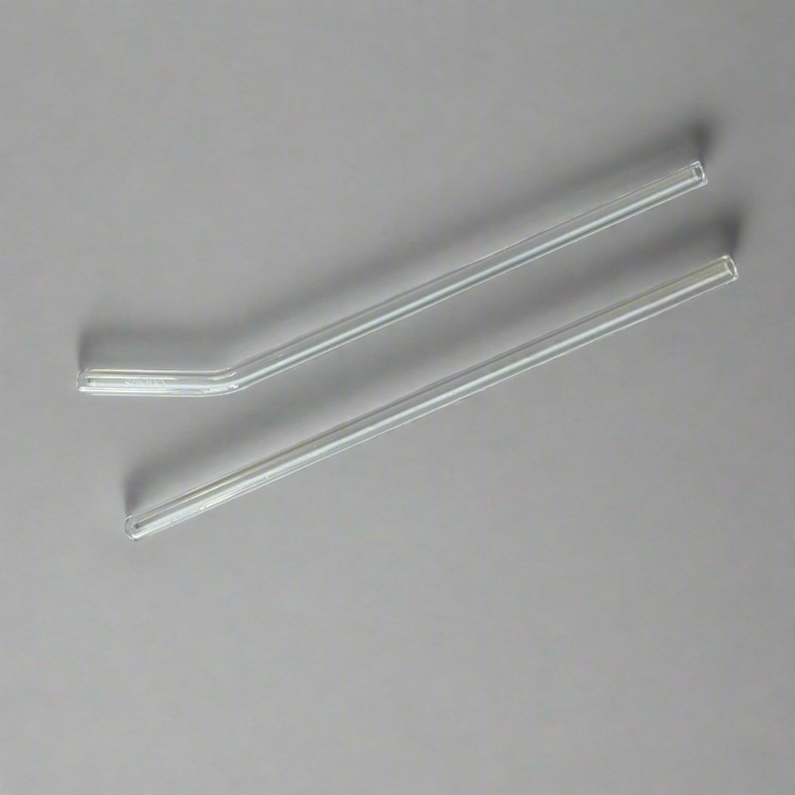 two glass drinking straws